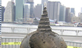 A large drill bit emerging from the Fulton Ferry Landing, Brooklyn.